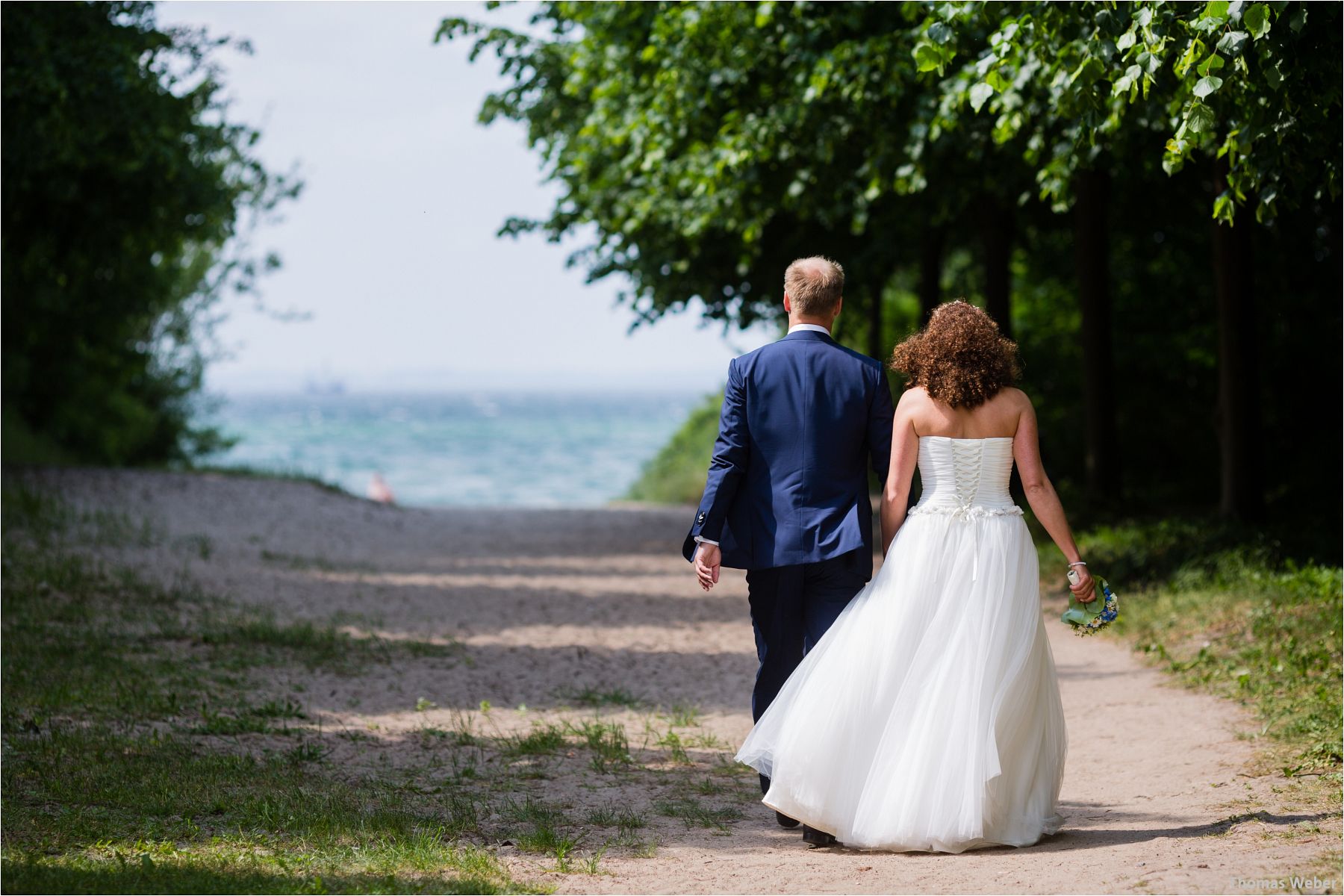 Hochzeitsfotograf Thomas Weber aus Oldenburg: Wunderschöne Hochzeit auf Schlossgut Groß Schwansee an der Ostsee