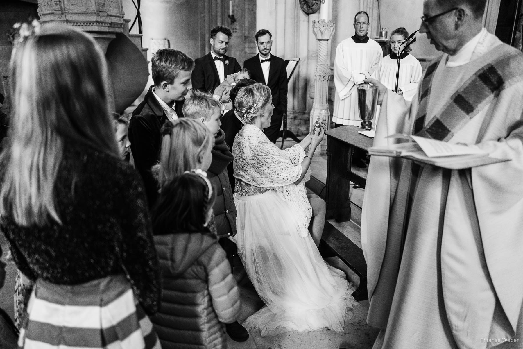 Kirchliche Trauung im Münsterland mit Taufe, Hochzeitsfotograf Thomas Weber