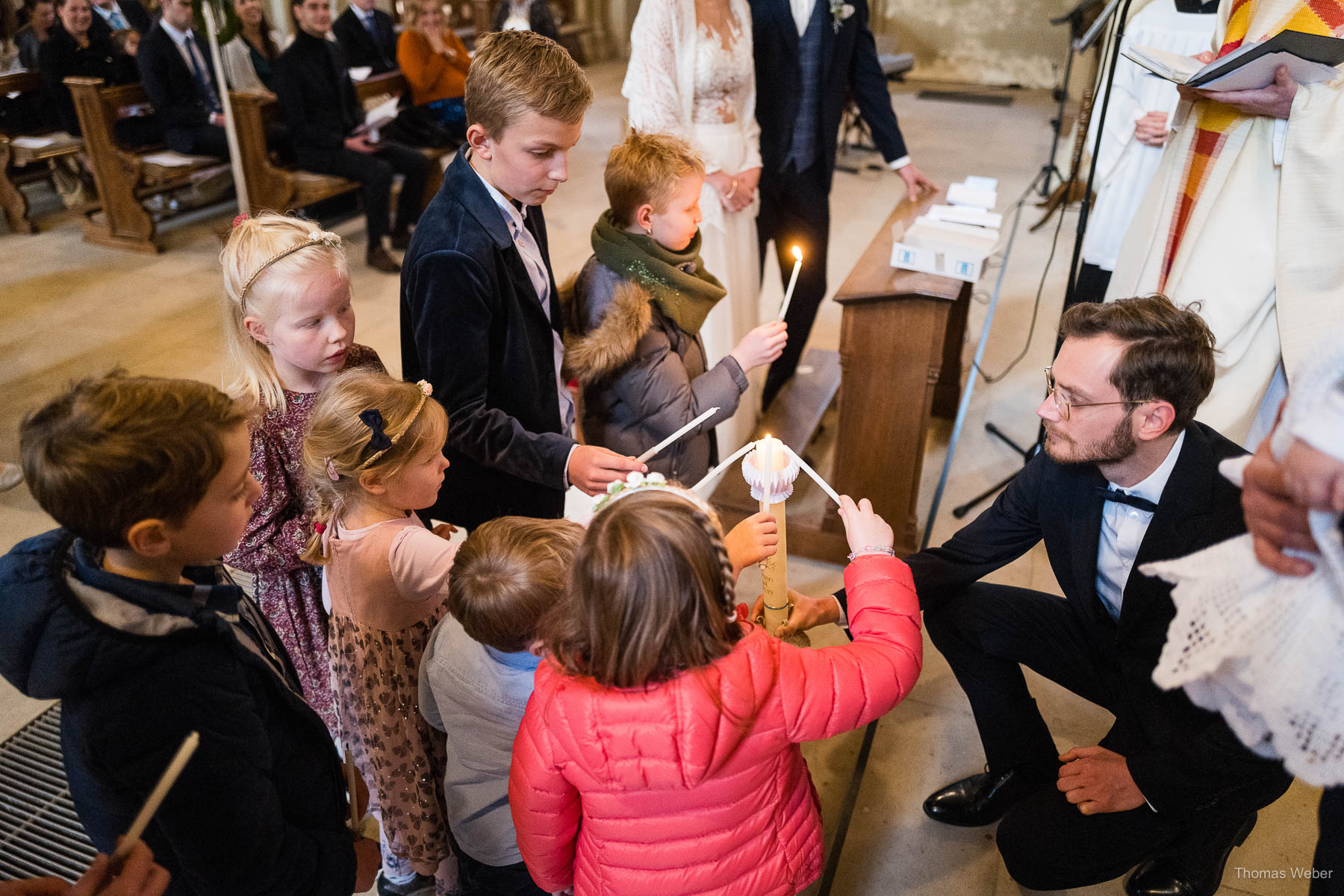 Kirchliche Trauung im Münsterland mit Taufe, Hochzeitsfotograf Thomas Weber