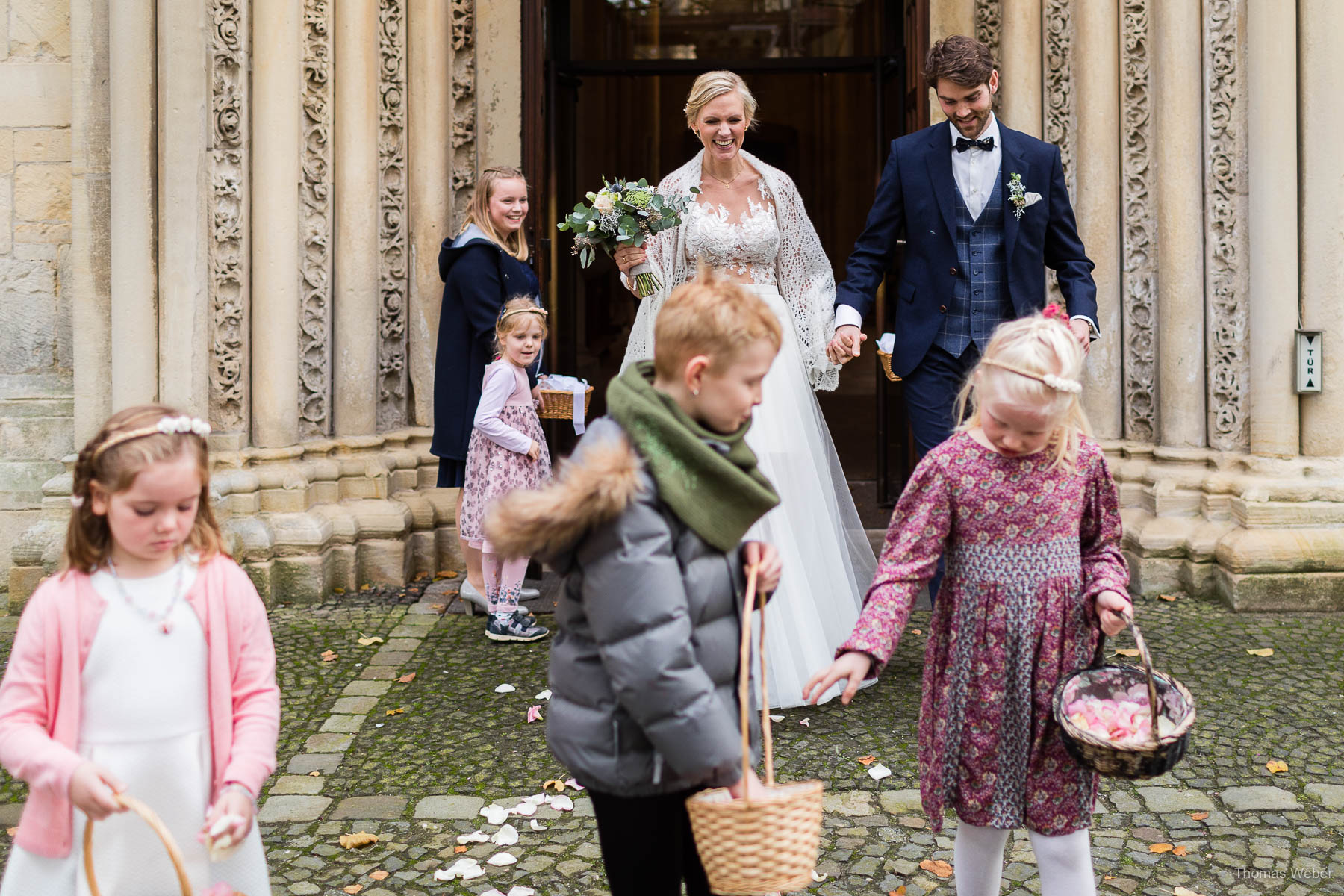 Kirchliche Trauung im Münsterland mit Taufe, Hochzeitsfotograf Thomas Weber